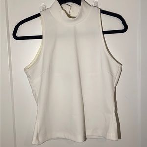 White mock neck blouse